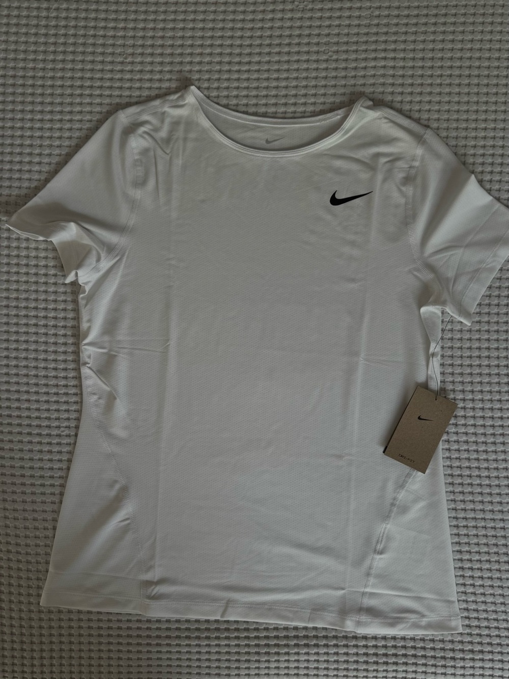 Nike White Short Sleeve Performance Tee with Black Swoosh